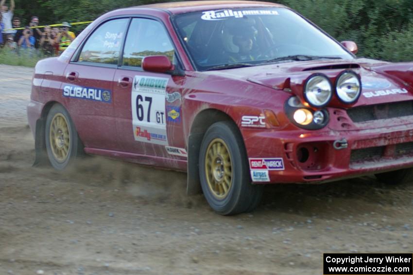 Bryan Pepp / Jerry Stang power away from the spectator point on SS14 in their Subaru WRX.