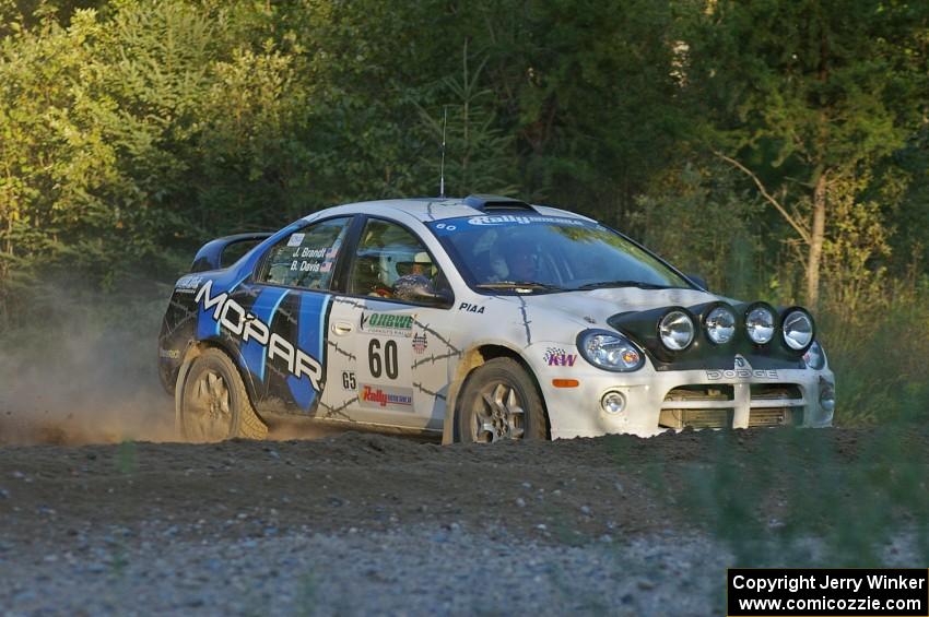 Bruce Davis / Jimmy Brandt set up for a hard-right at the SS14 spectator point in their Dodge SRT-4.