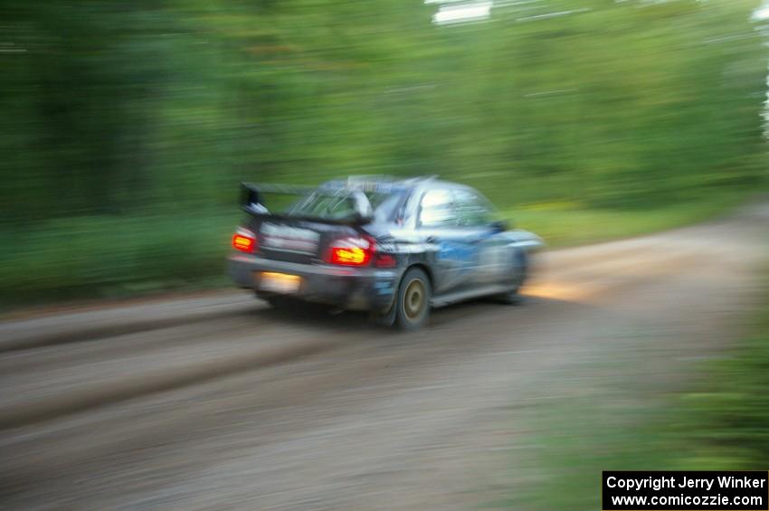 Jonathan Bottoms / Carolyn Bosley Subaru WTX STi rockets away from the start of SS16.