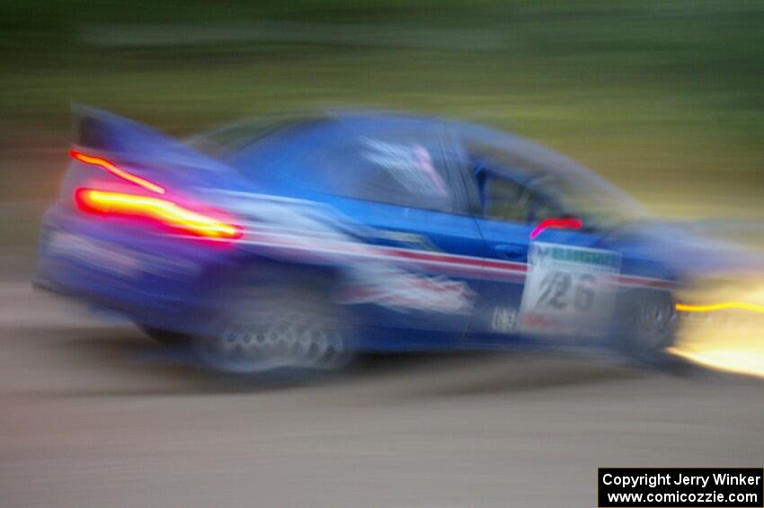 Cary Kendall / Scott Friberg at speed at dusk in their Dodge SRT-4 on SS16.