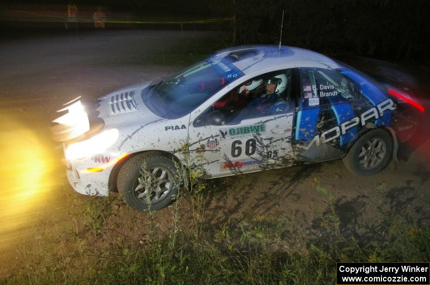 Bruce Davis / Jimmy Brandt at speed through a left-hander on SS16 in their Dodge SRT-4.