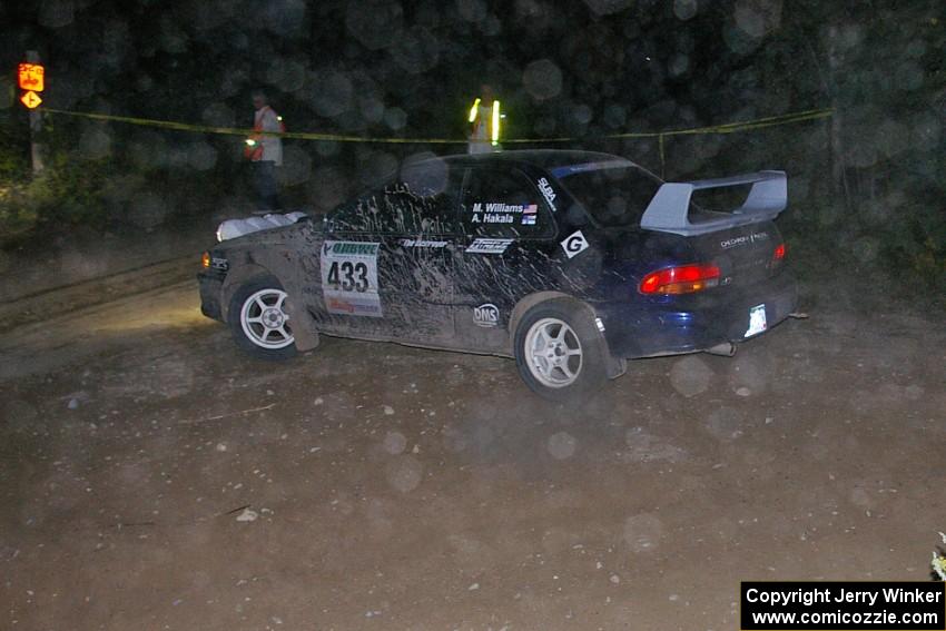 Mitch Williams / Alix Hakala Subaru Impreza almost take a wrong turn on SS16.