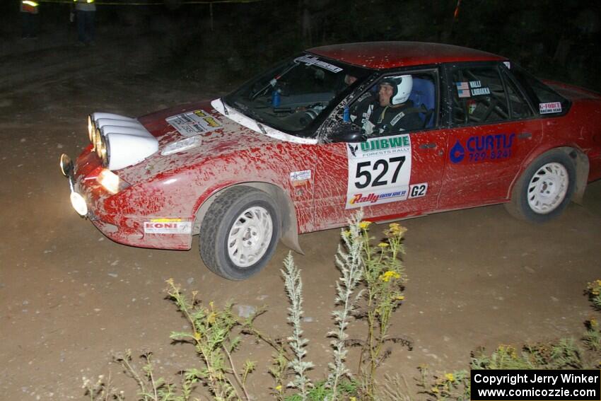 Craig Walli / Jonah Liubakka Saturn SL2 on SS16, the longest stage of the rally.