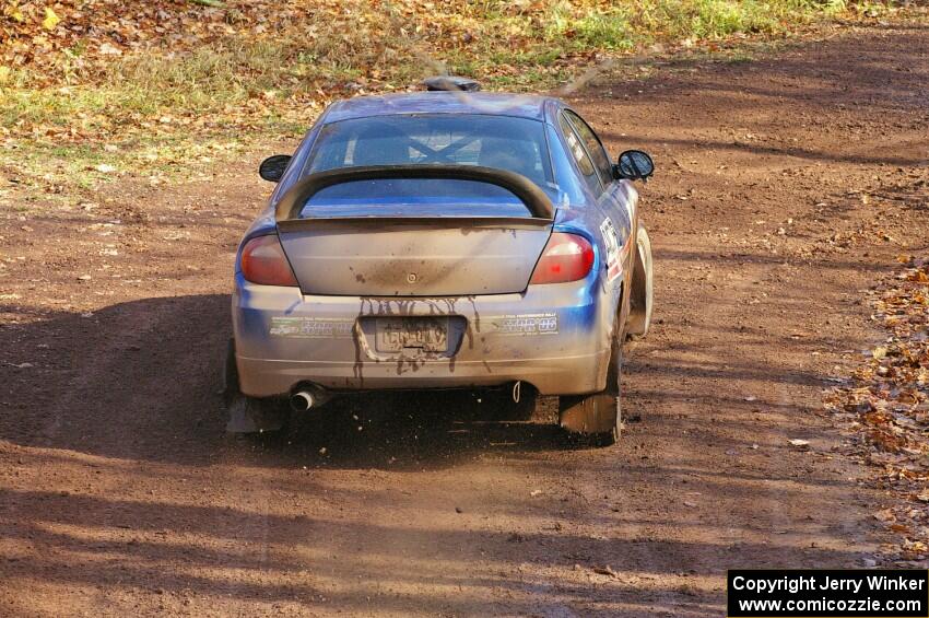 Cary Kendall / Scott Friberg take an easy approach to the final greasy corner of SS8, Gratiot Lake 1, in their Dodge SRT-4.