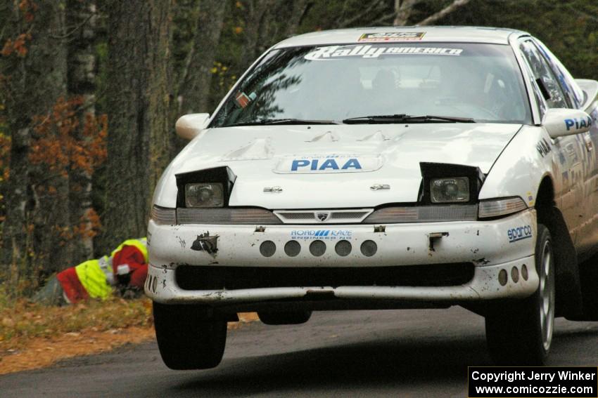 Matt Huuki / Josh VanDenHeuvel catch air at the midpoint jump on Brockway 1, SS11, in their Eagle Talon.