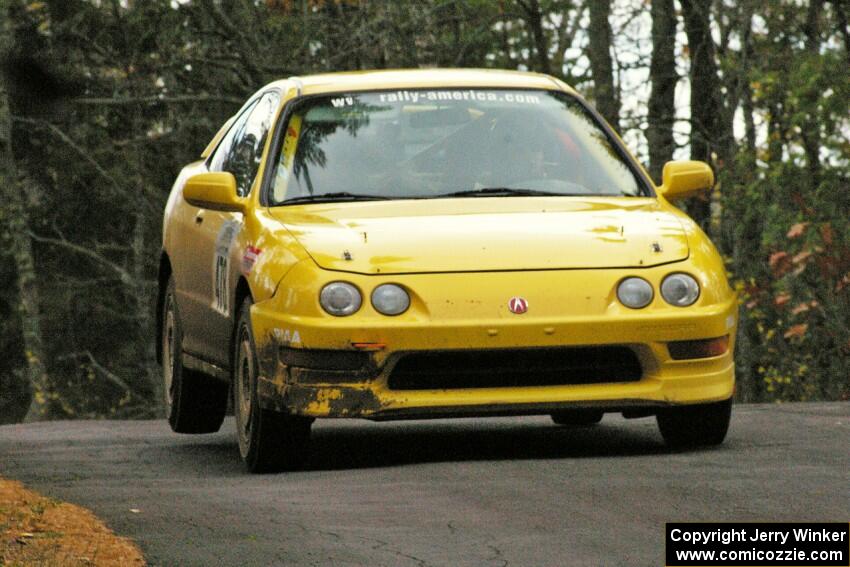 Evan Moen / Dan Victor get the back end of their Acura Integra Type R light over the midpoint jump on Brockway 1, SS11.