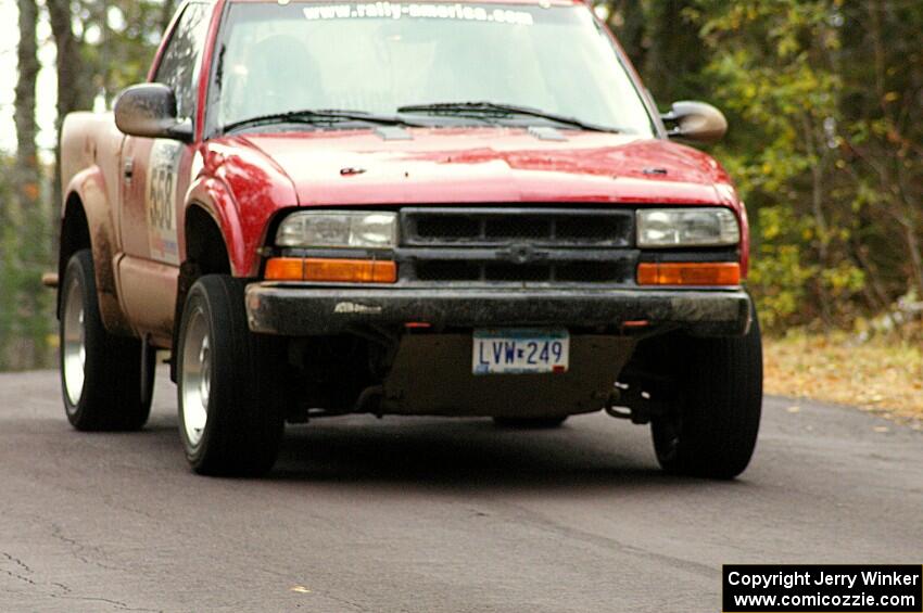 Jim Cox / Scott Parrott kept their Chevy S-10 glued to the pavement over the midpoint jump on Brockway 1, SS11.