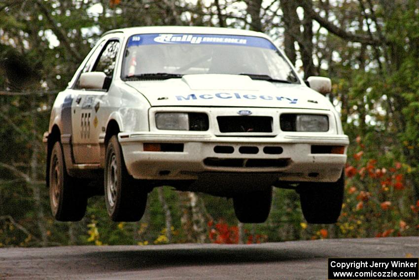 Colin McCleery / Nancy McCleery	catch nice air over the midpoint jump on Brockway 1, SS11, in their Merkur XR-8.