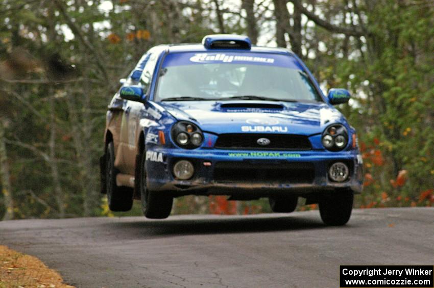 Heath Nunnemacher / Chris Coughlin catch a little air at the midpoint jump on Brockway 1, SS11, in their Subaru WRX.