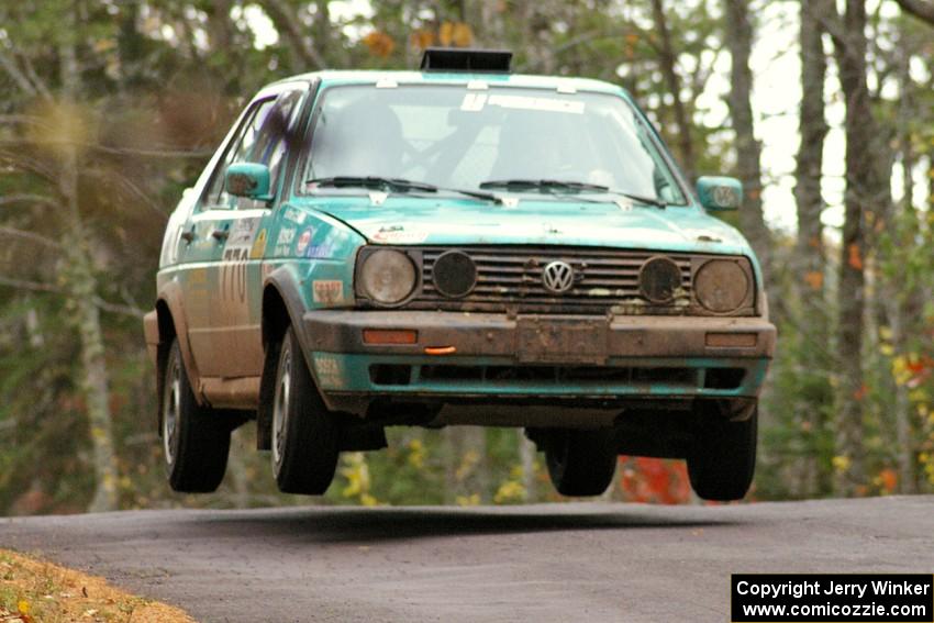 Miles Bothee / Ben Slocum catch decent air on SS11, Brockway 1, in their VW Jetta.