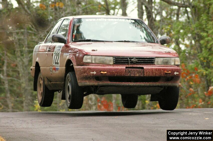 Rob Stroik / Ross Wegge catch nice air over the midpoint jump on Brockway 1, SS11, in their Nissan Sentra SE-R.