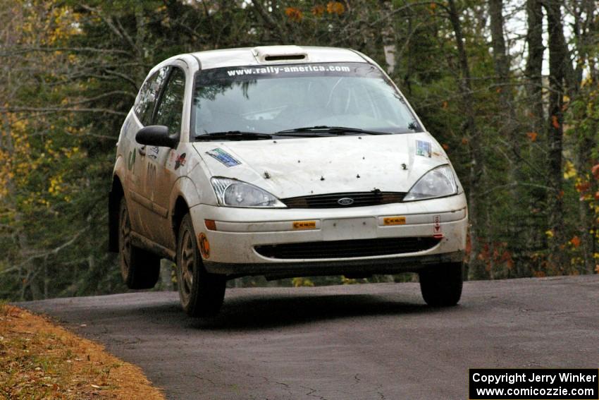 Mike Gagnon / Bob Martin get the back end light at the midpoint jump on Brockway 1, SS11, in their Ford Focus ZX3.