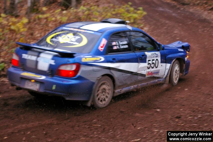 Kyle Sarasin / Stuart Sarasin drift through the first corner of Gratiot Lake 2, SS15, in their Subaru WRX.